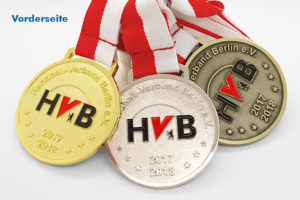 Medaille zweiseitig geprägt - mehrfarbig in gold, silber, bronze